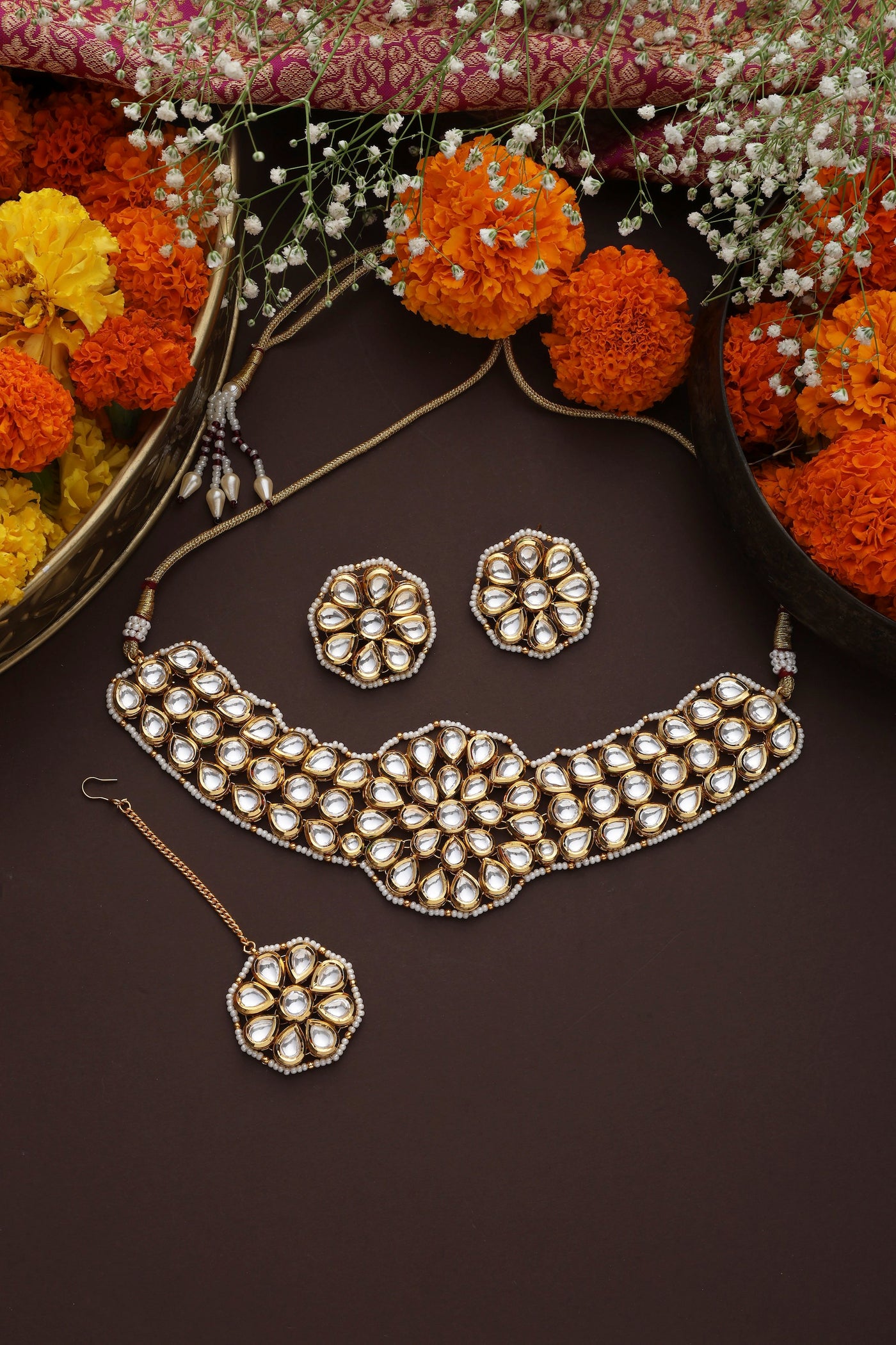 Nishita Gold Kundan Choker Set with Maang Tikka