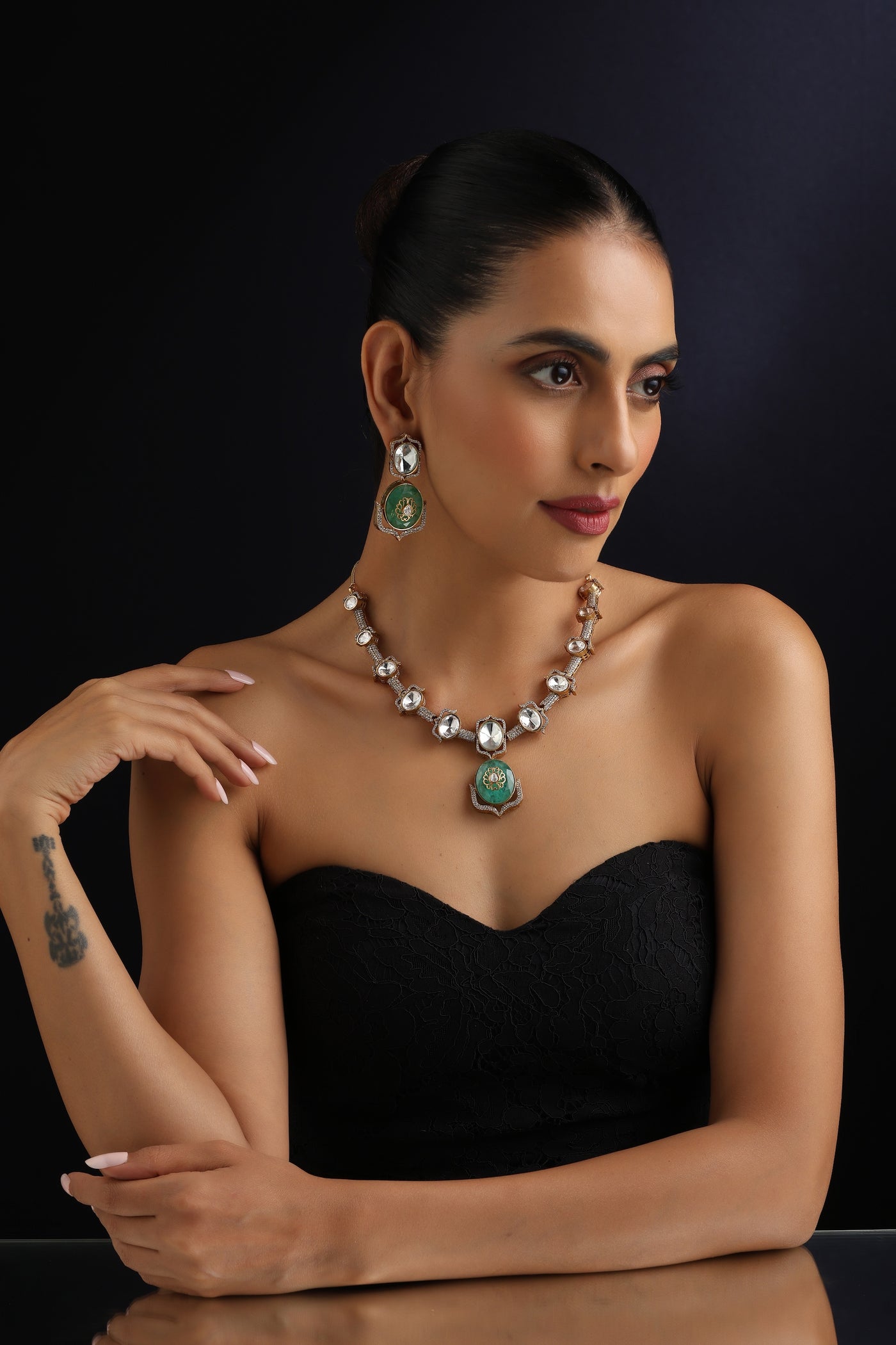 Prema Emerald and Polki Hasli Necklace Set