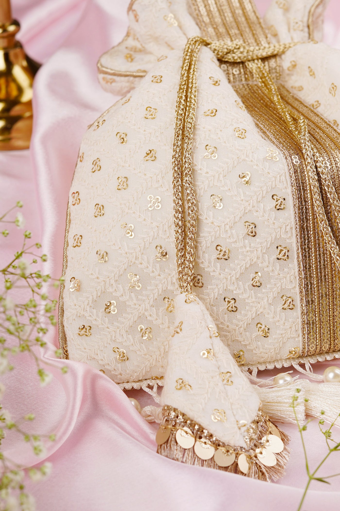 Zulfi White Georgette with Gold Sequin Potli Bag