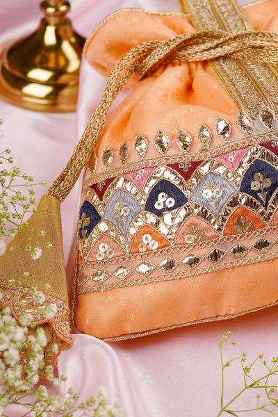 Kavya Peach Brocade Potli Bag